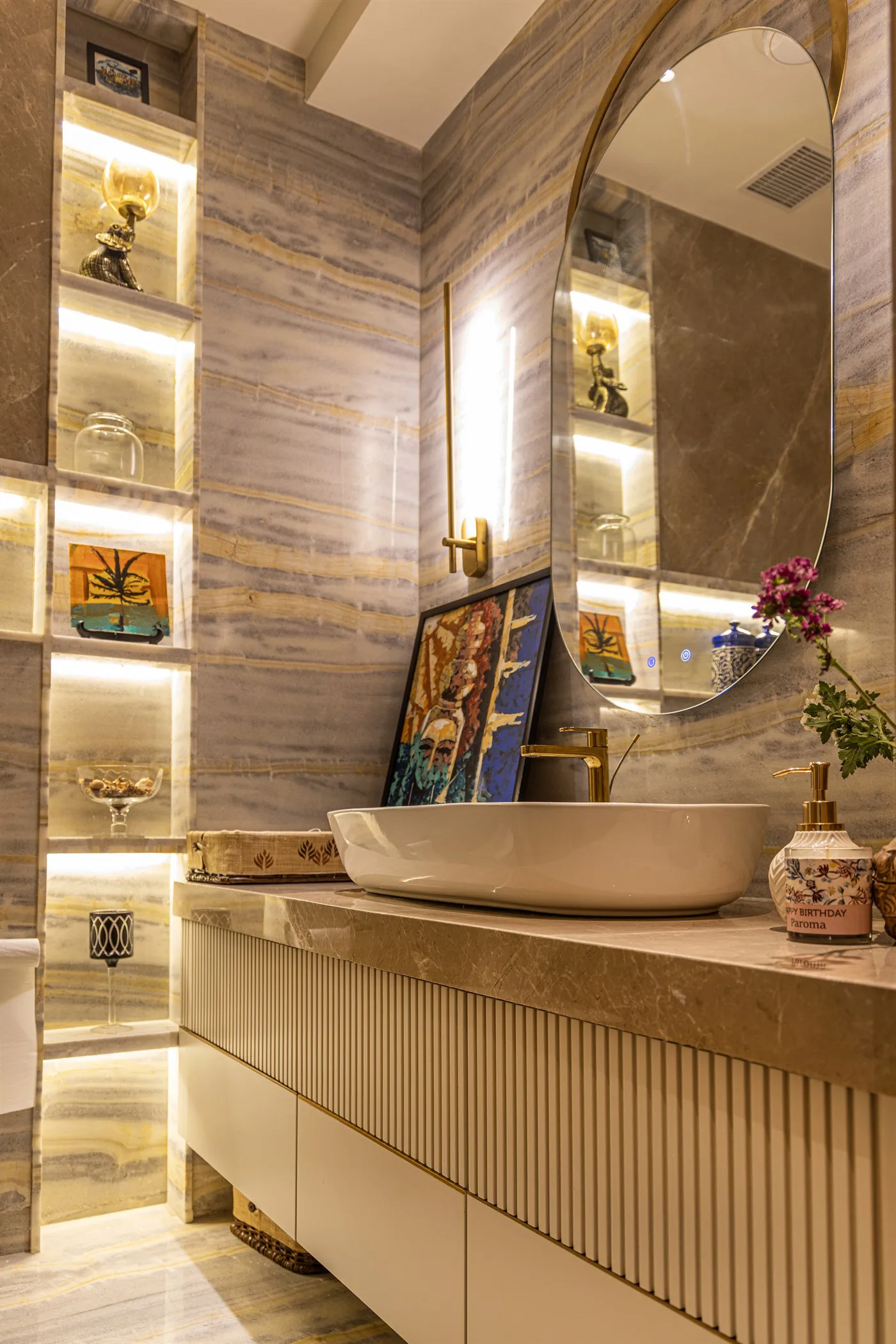 Curved oak joinery against figured marble — 601, Camellias