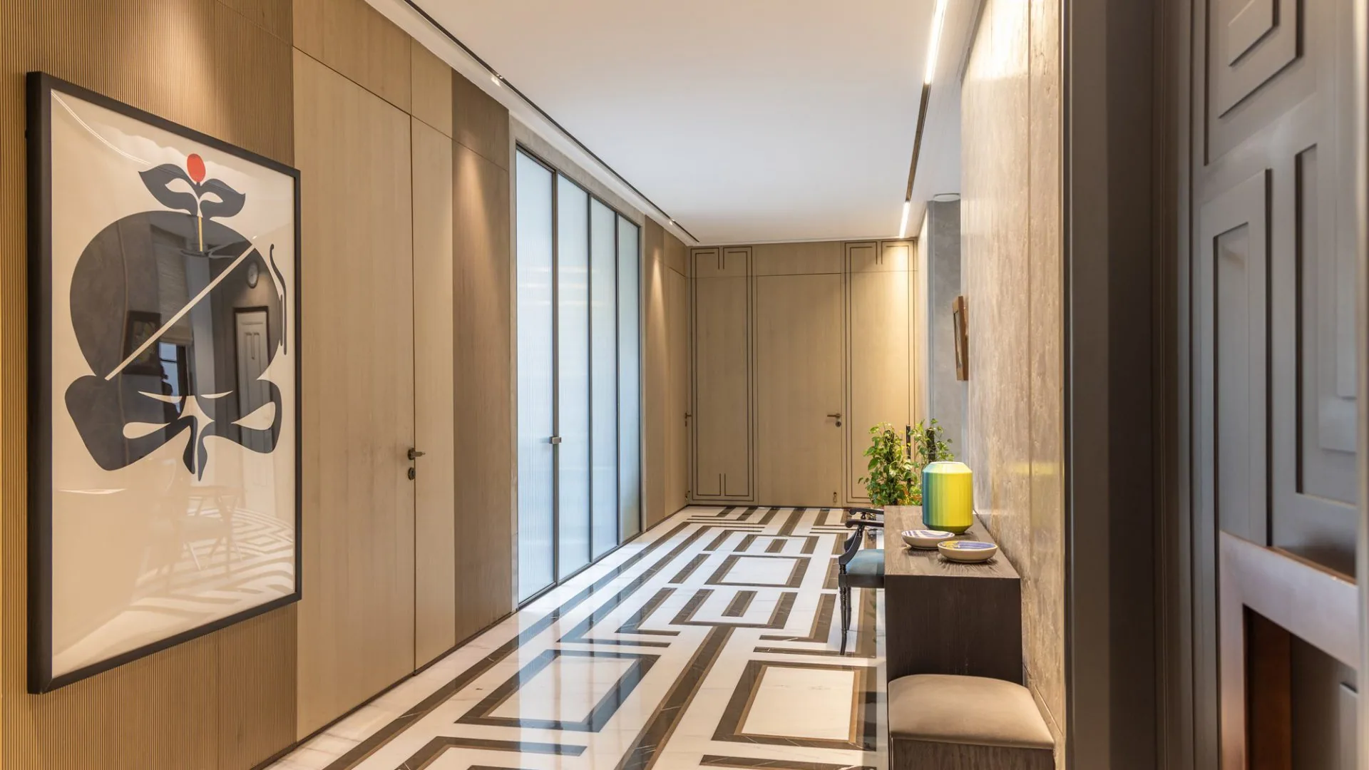 Entrance corridor with panelled joinery and inlaid marble floor — Gulmohar Park
