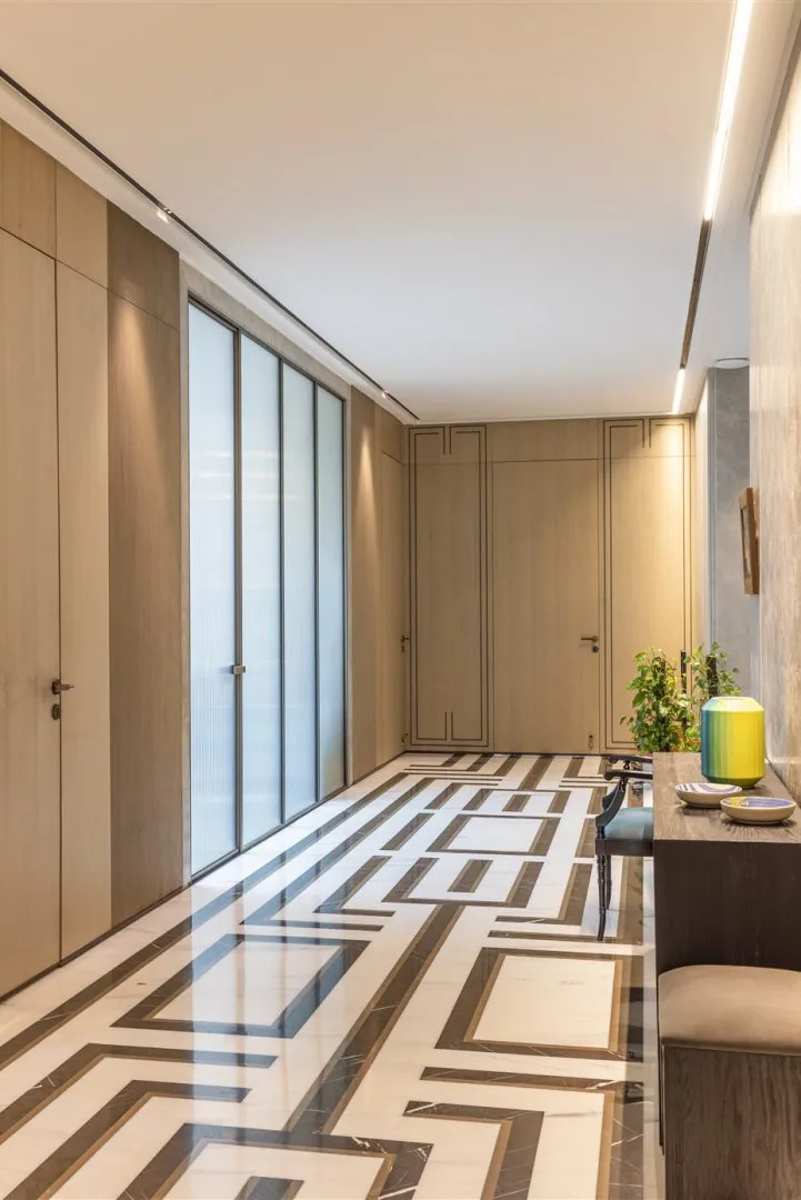 Entrance corridor with panelled joinery and inlaid marble floor — Gulmohar Park