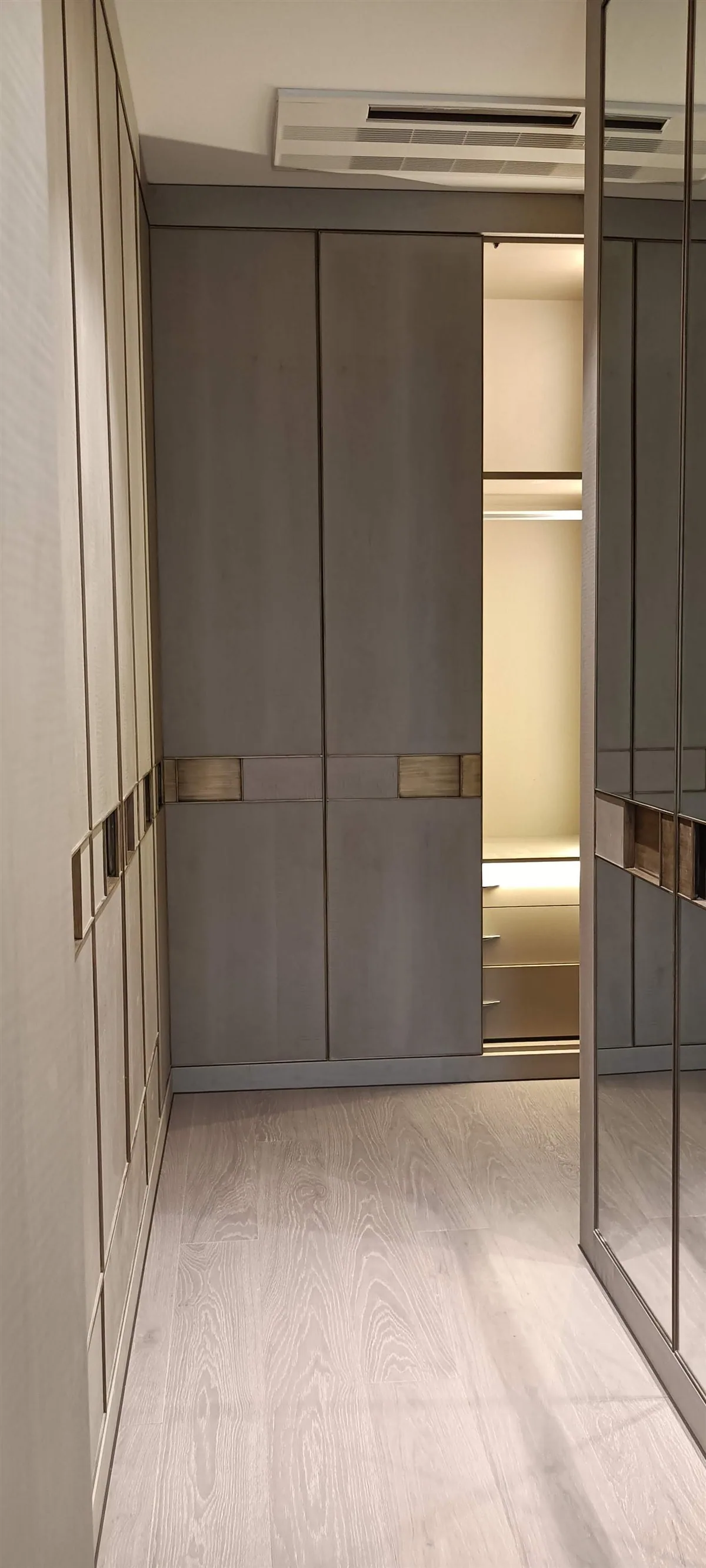 Walk-in wardrobe with brass inlay detailing — 14 Jorbagh