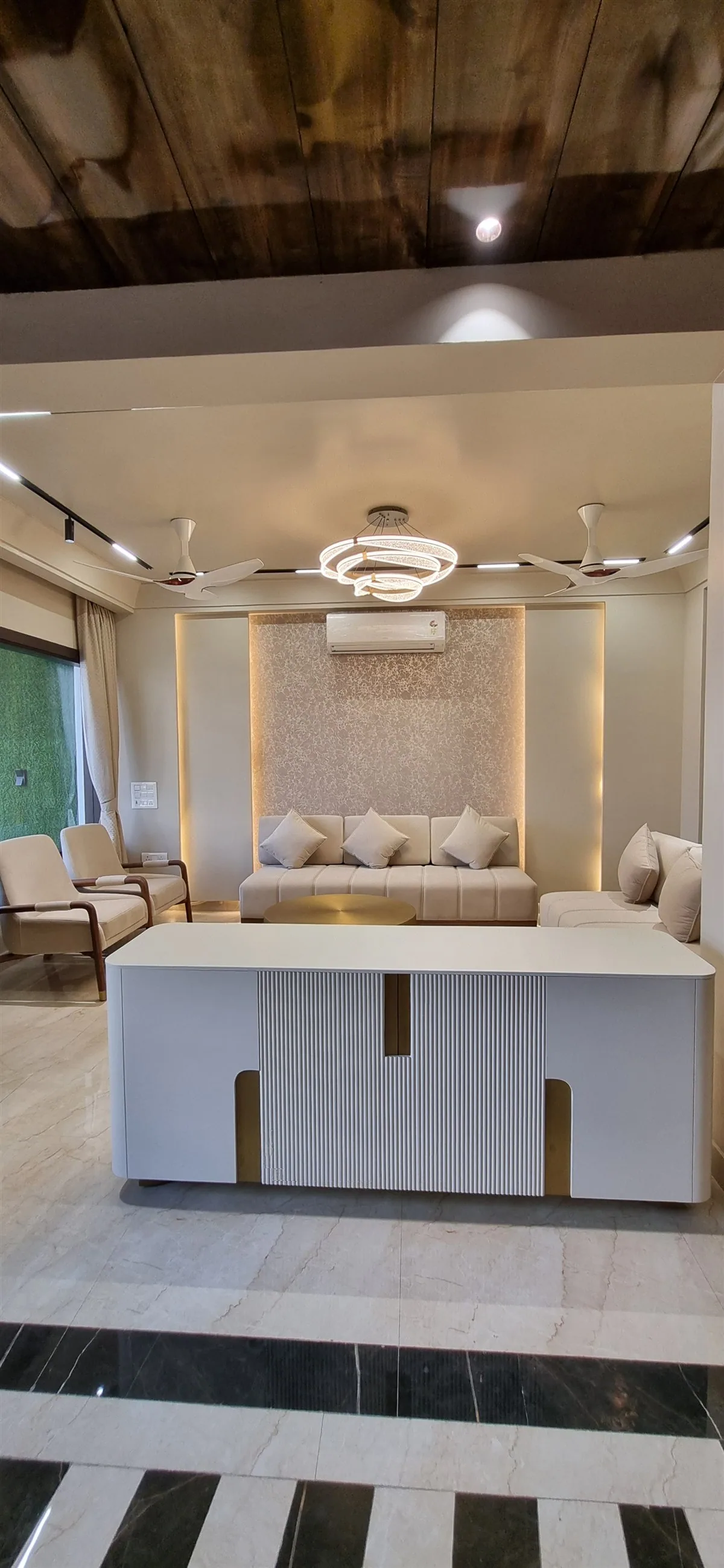 Living room console and panelled ceiling — Mr Mohak residence