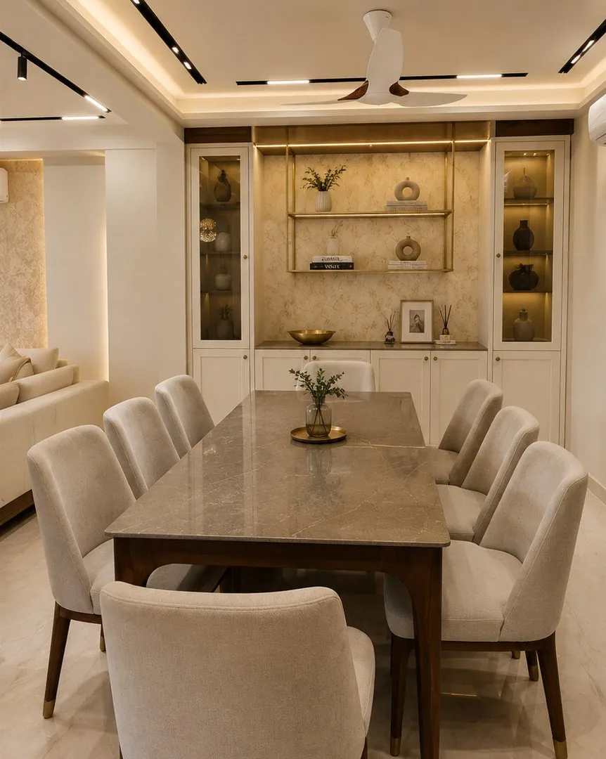 Dining room with display cabinets and brass shelving — Mr Mohak